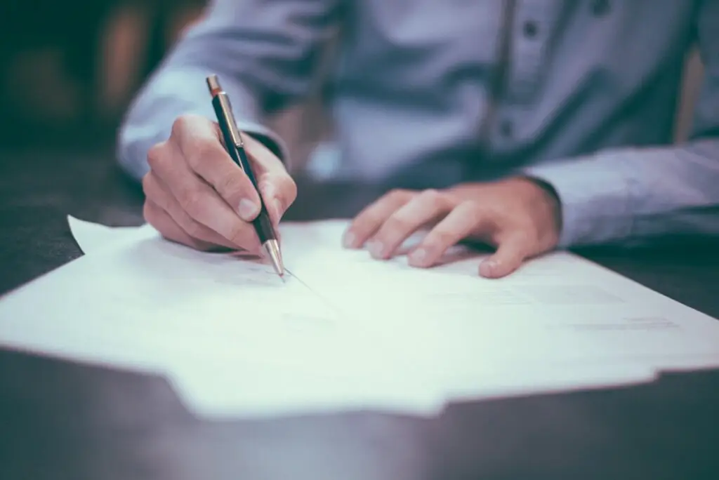 Document with pen representing RAD service standards