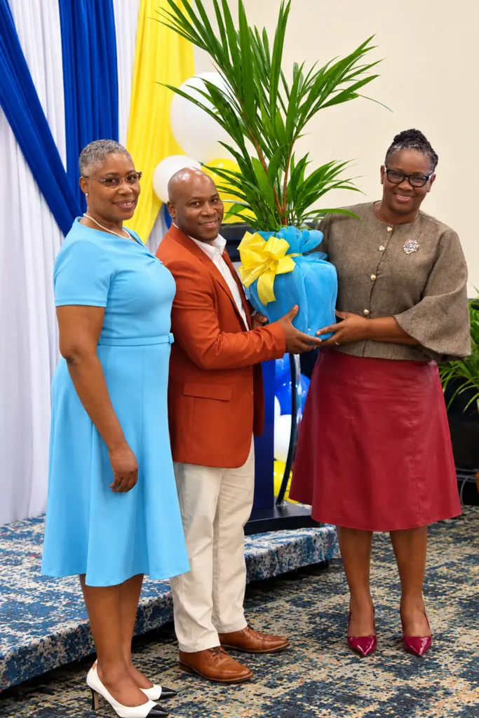 Mrs. Cynthia Marshall-Lowe receives the Outstanding Manager of the Year award.